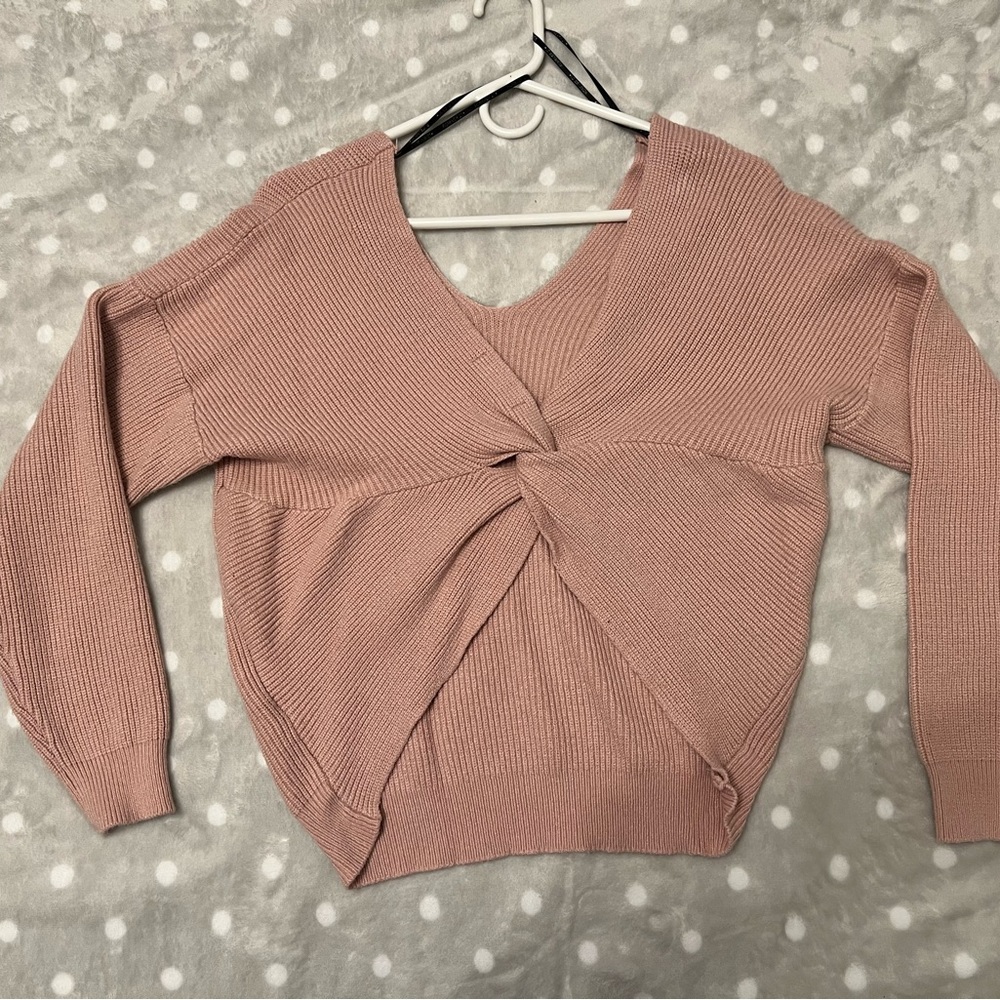 Pink knitted knot sweater